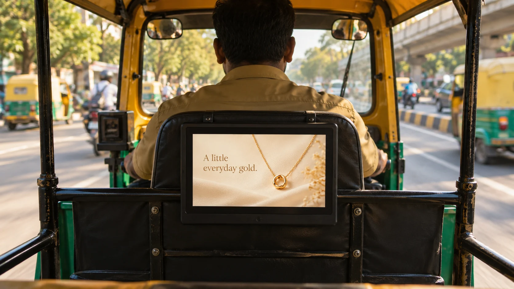 Passenger-facing advertising inside an auto